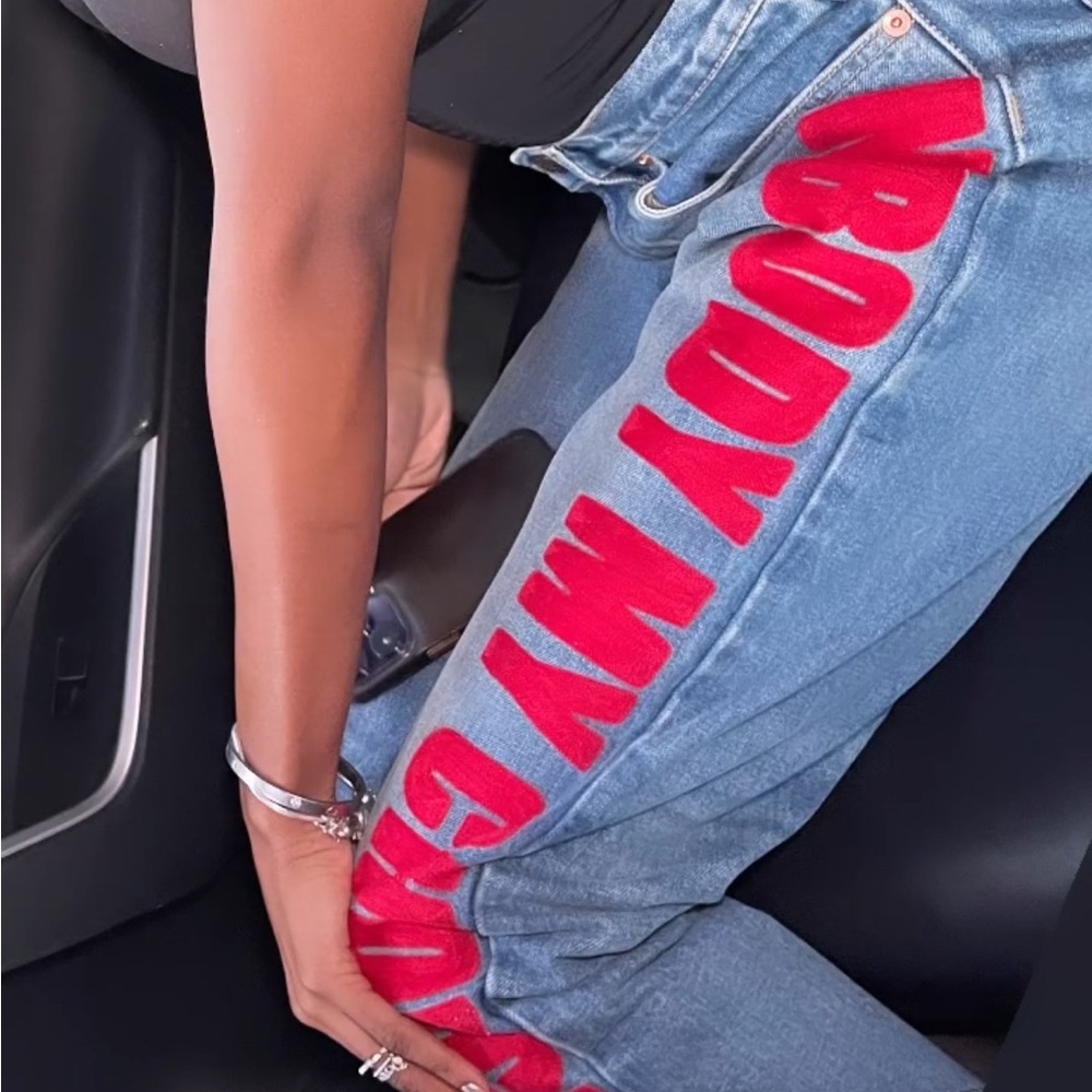 Gucci Blue Jeans with Red Lettering